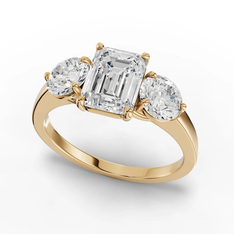 Emerald trinity diamond ring yellow gold angle