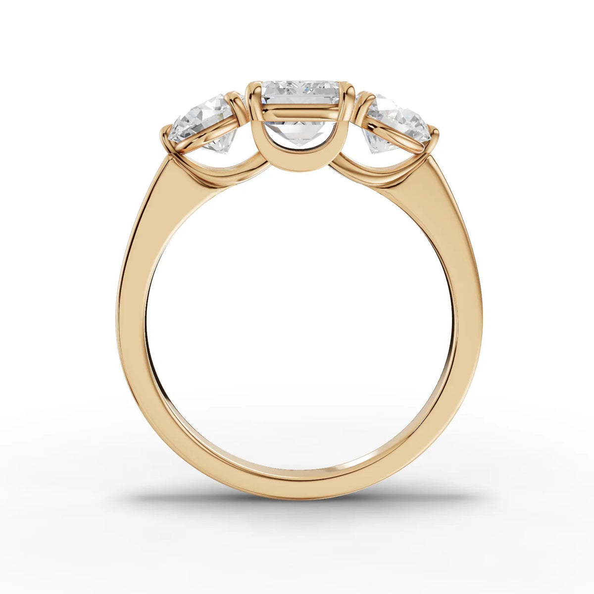 Emerald trinity lab-grown ring yellow gold close-up