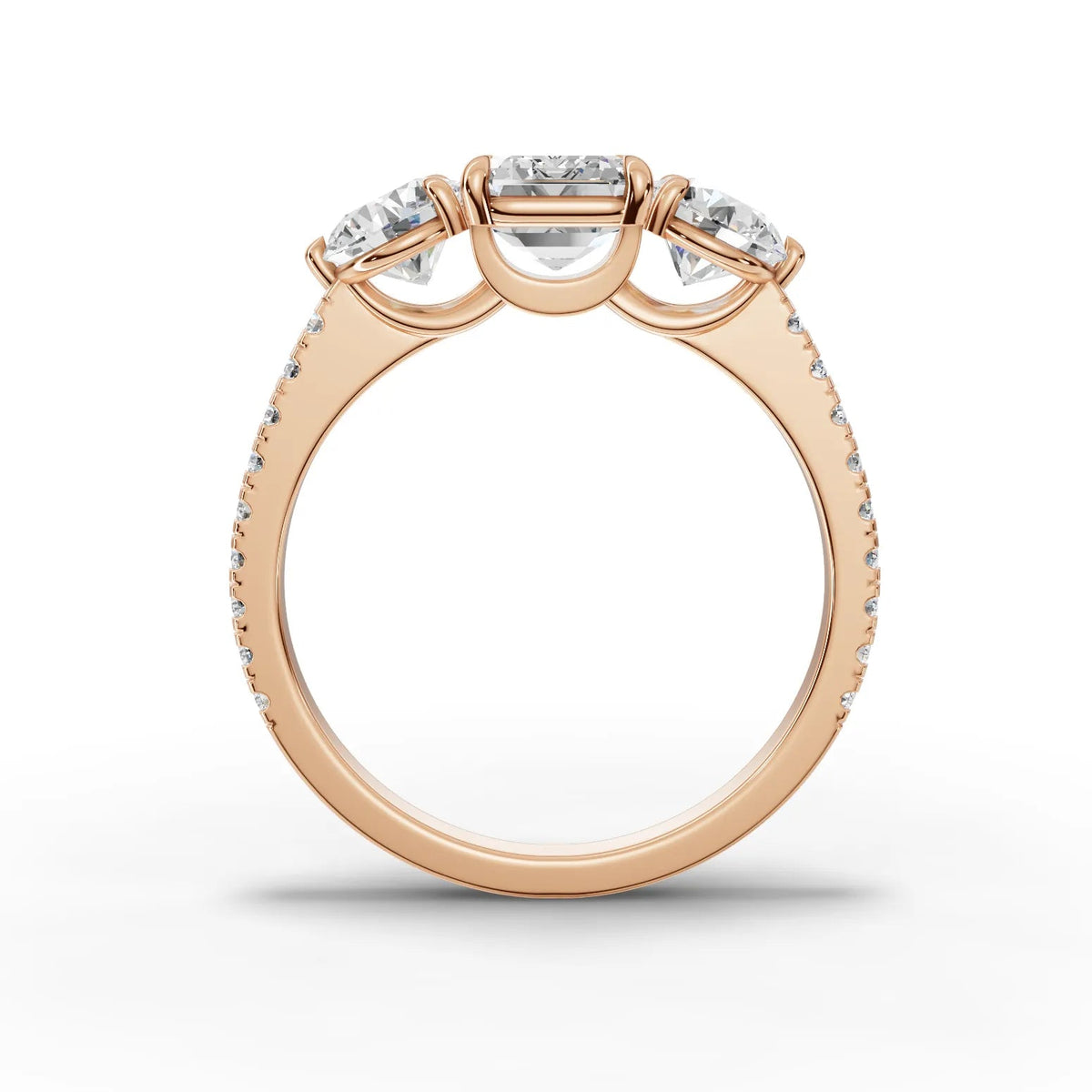 Emerald trinity lab-grown ring rose gold close-up
