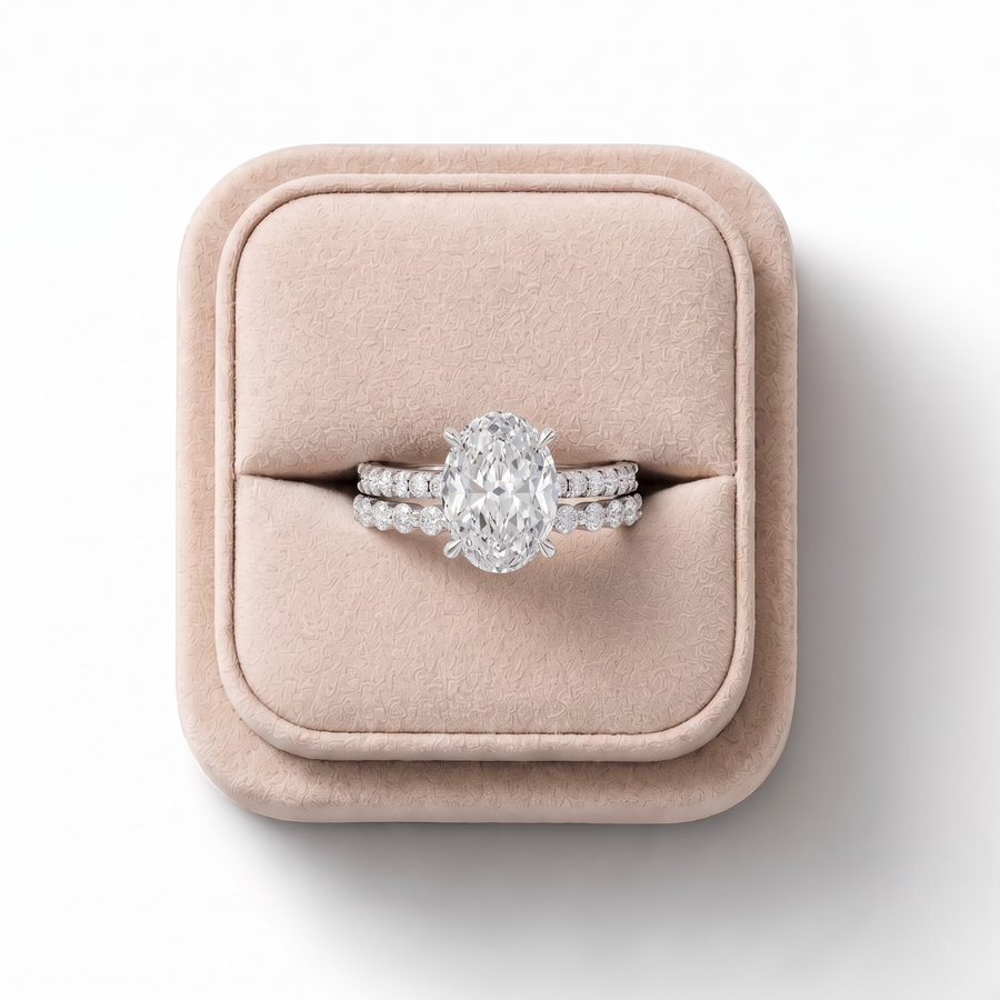 2.38 CT Oval Solitaire with Matching Pavé Lab Grown Diamond Band Set, on a white background