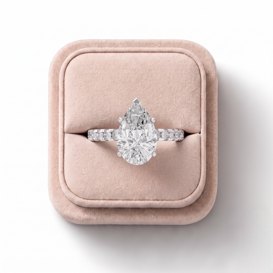 2.42 CT Pear Solitaire With Side Stone Lab Grown Diamond Band Ring, on a white background
