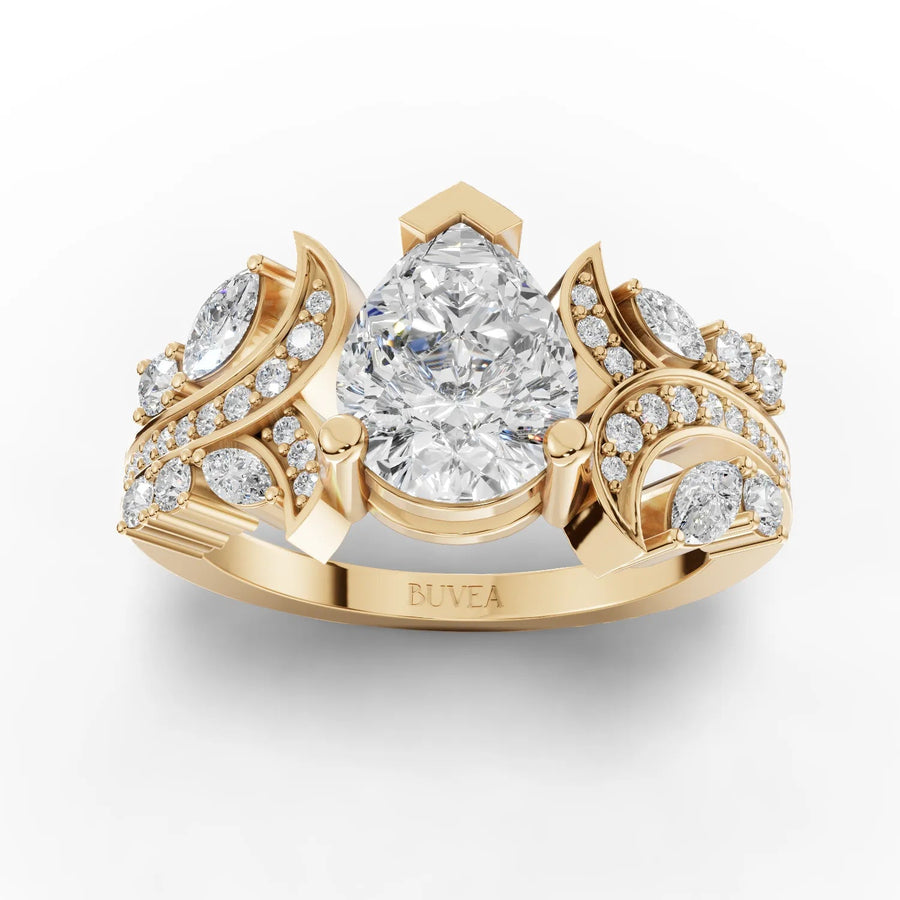 Pear accent diamond ring rose gold top view