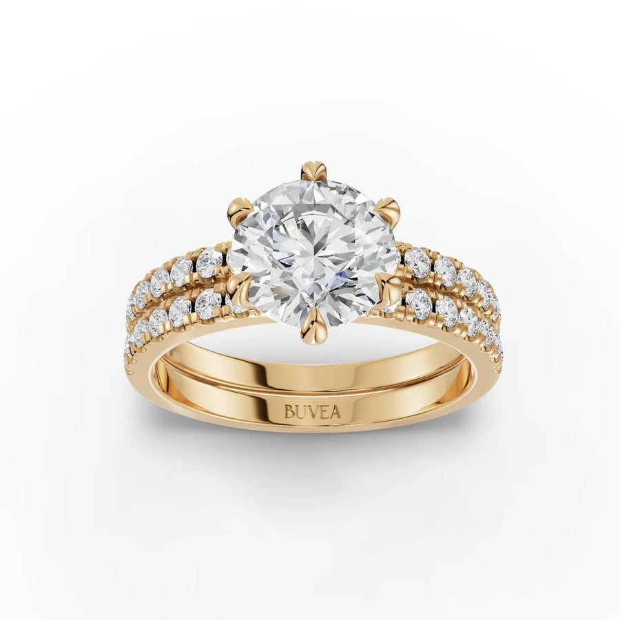 Round lab grown diamond ring featuring a 1.5 CT center stone, set in gold with double row accent diamonds on the band.