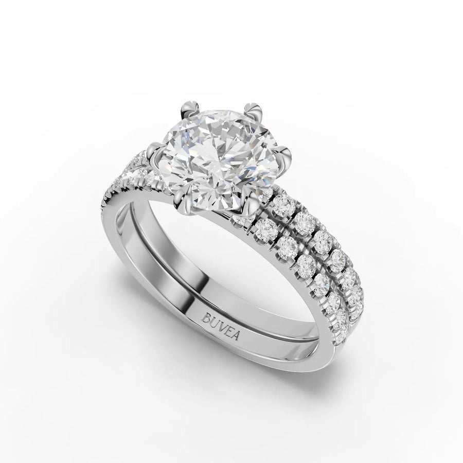 Lab grown diamond ring featuring a 1.5 CT round center stone, set in polished gold, with double-row accent diamonds on the band.