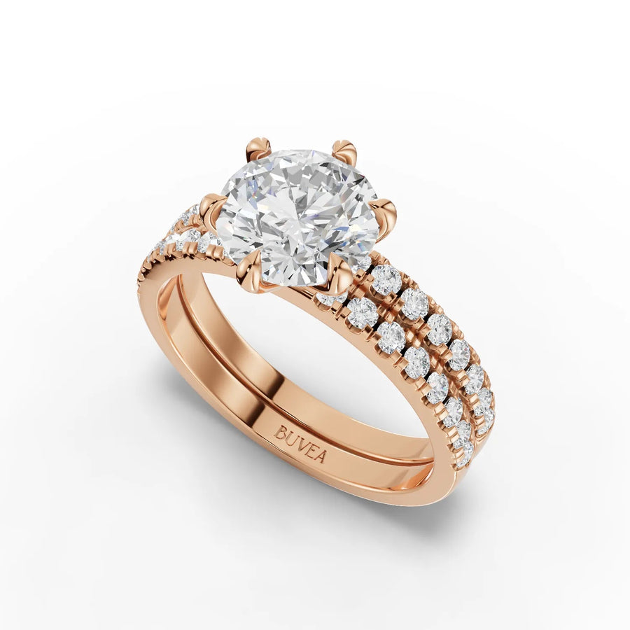 Round lab grown diamond ring featuring a 1.5 CT center stone, set in rose gold with double row accent diamonds.