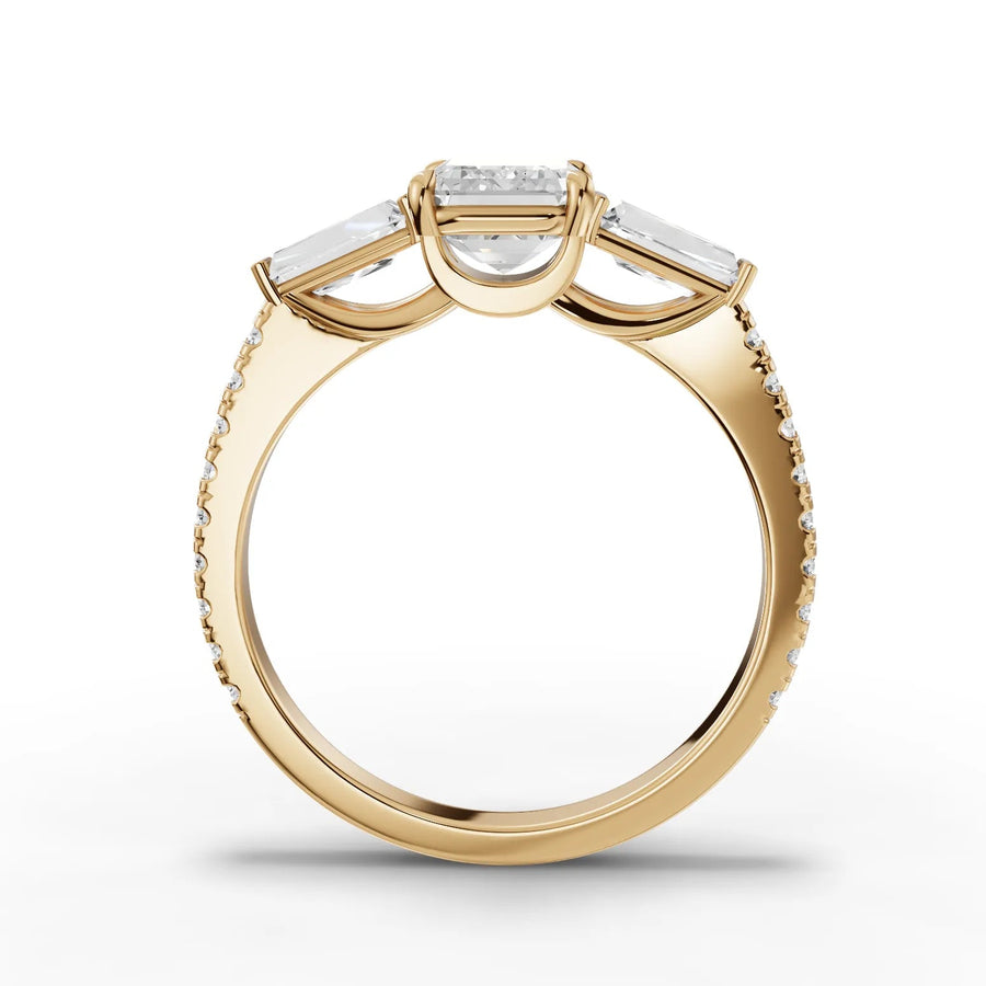 Emerald baguette lab-grown ring yellow gold close-up