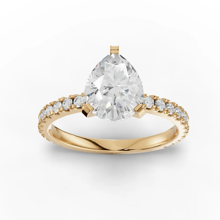 Yellow gold pear pavé diamond ring