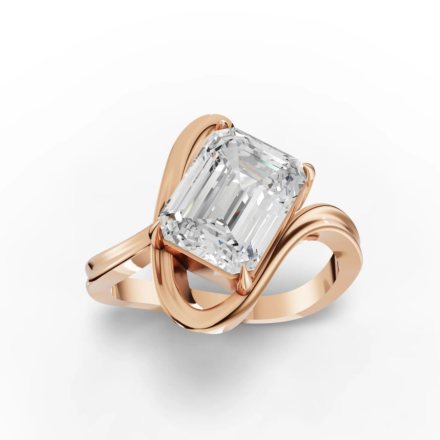 Emerald solitaire ring rose gold angle
