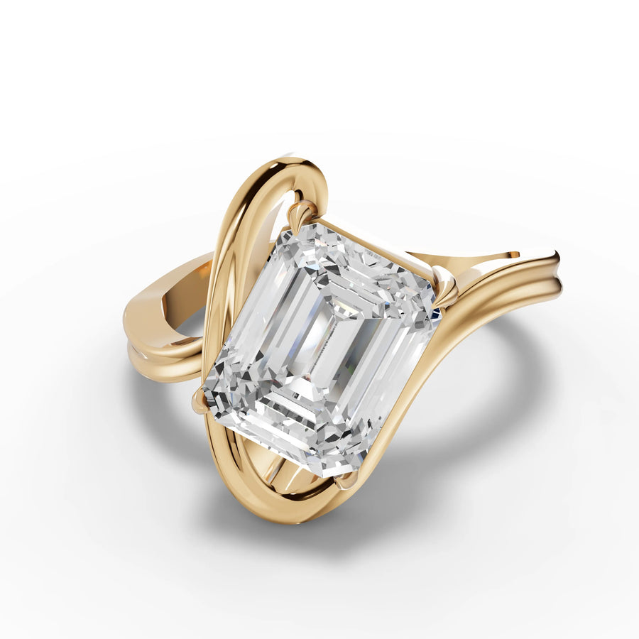 Emerald solitaire ring yellow gold angle