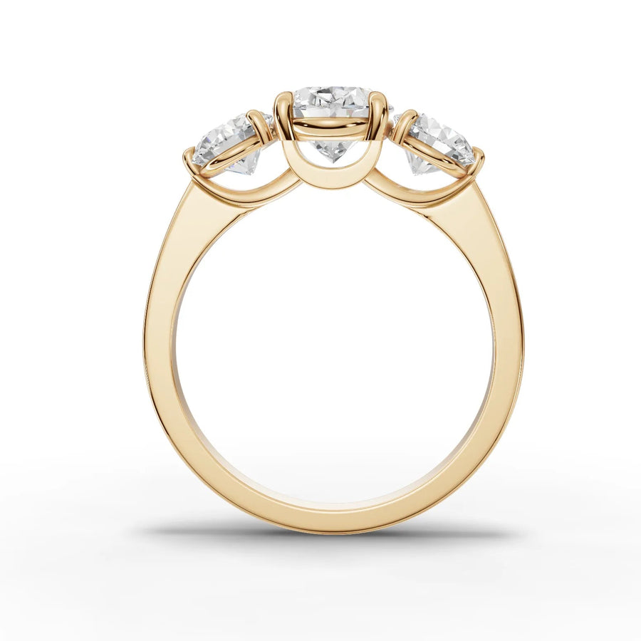 Oval trinity lab-grown ring yellow gold close-up