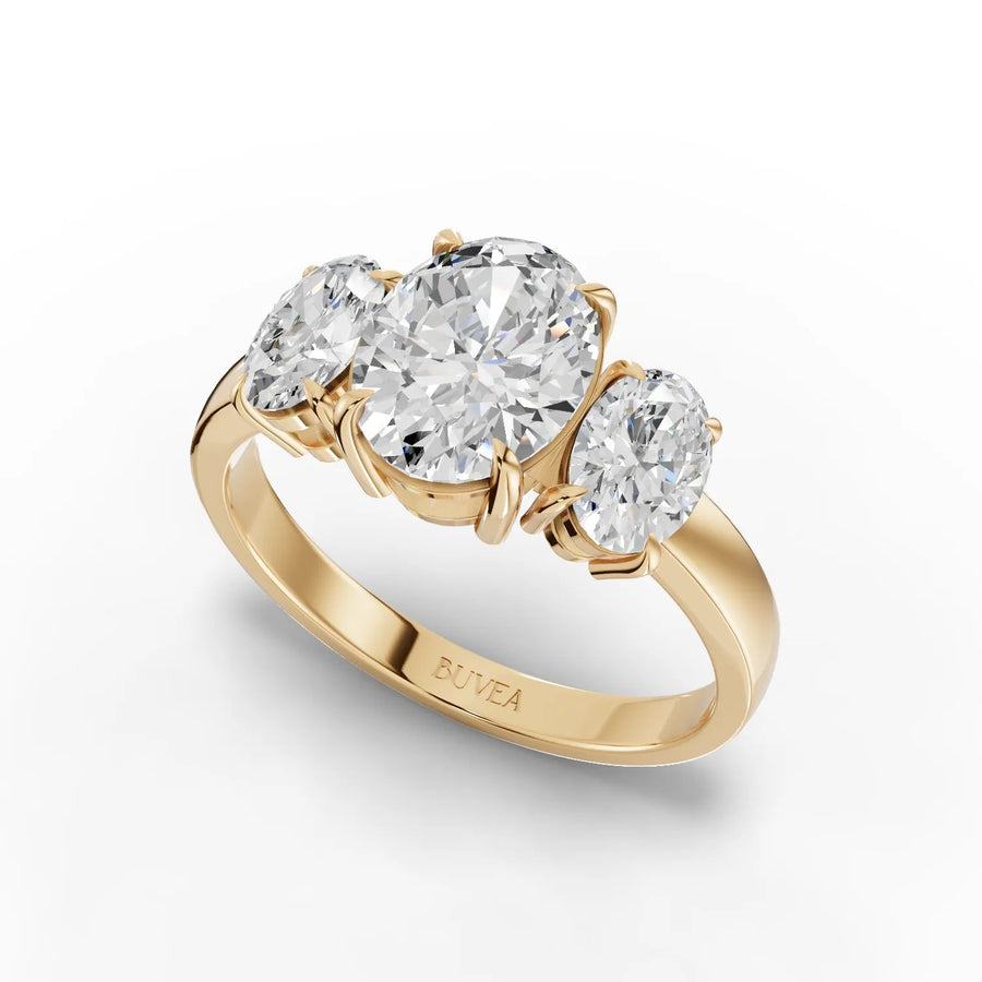 Oval trio diamond ring yellow gold angled profile