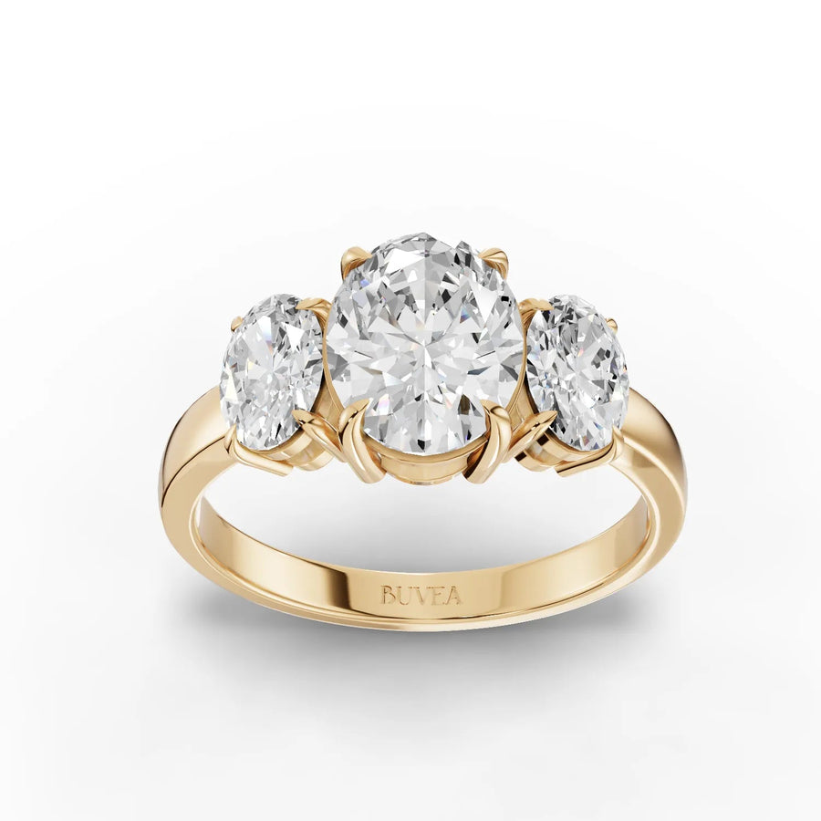 Three-stone oval diamond ring yellow gold top view