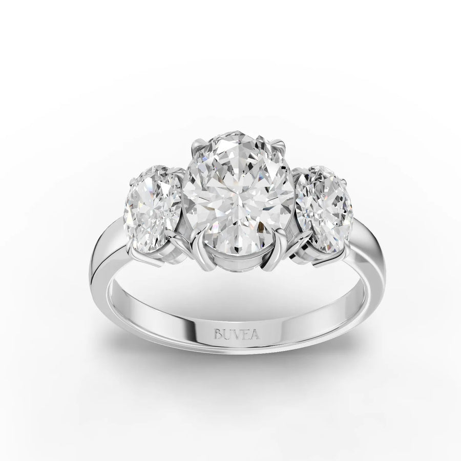2.50 CT oval three-stone lab diamond ring in 18K gold with 1.5 CT center and matching oval side stones