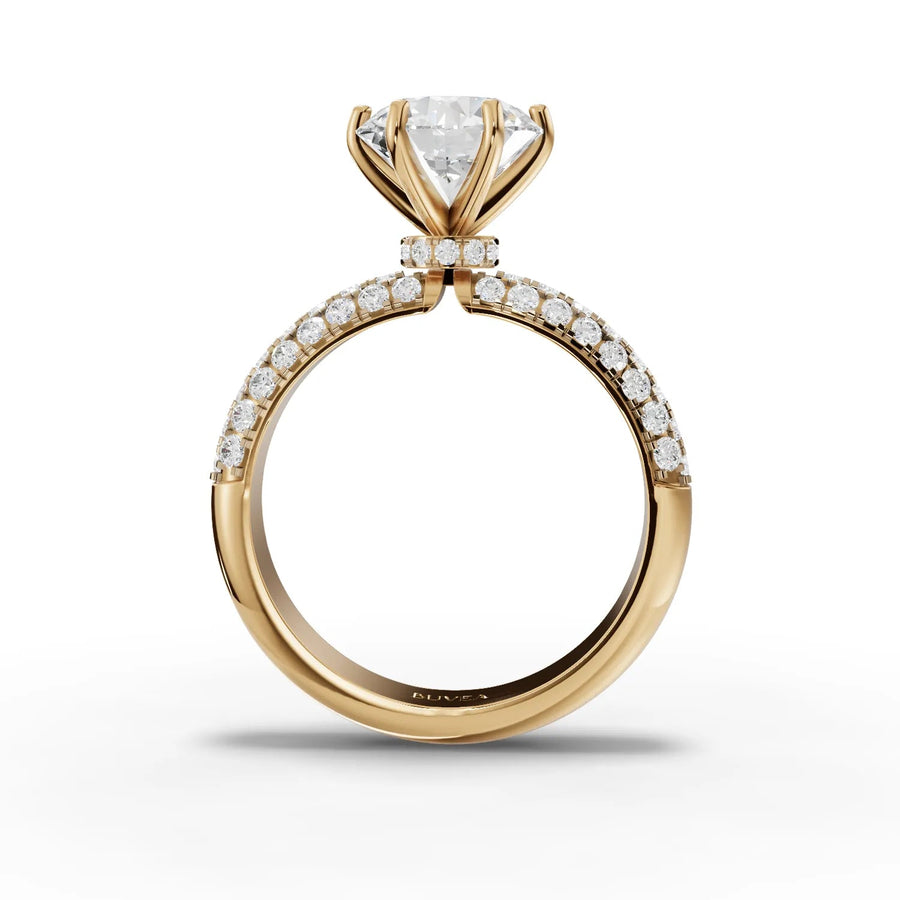 Round hidden halo ring yellow gold close-up