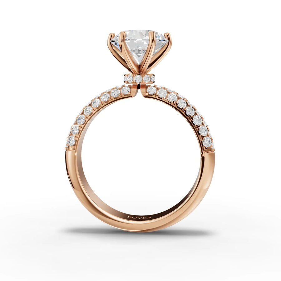 Round hidden halo ring rose gold close-up