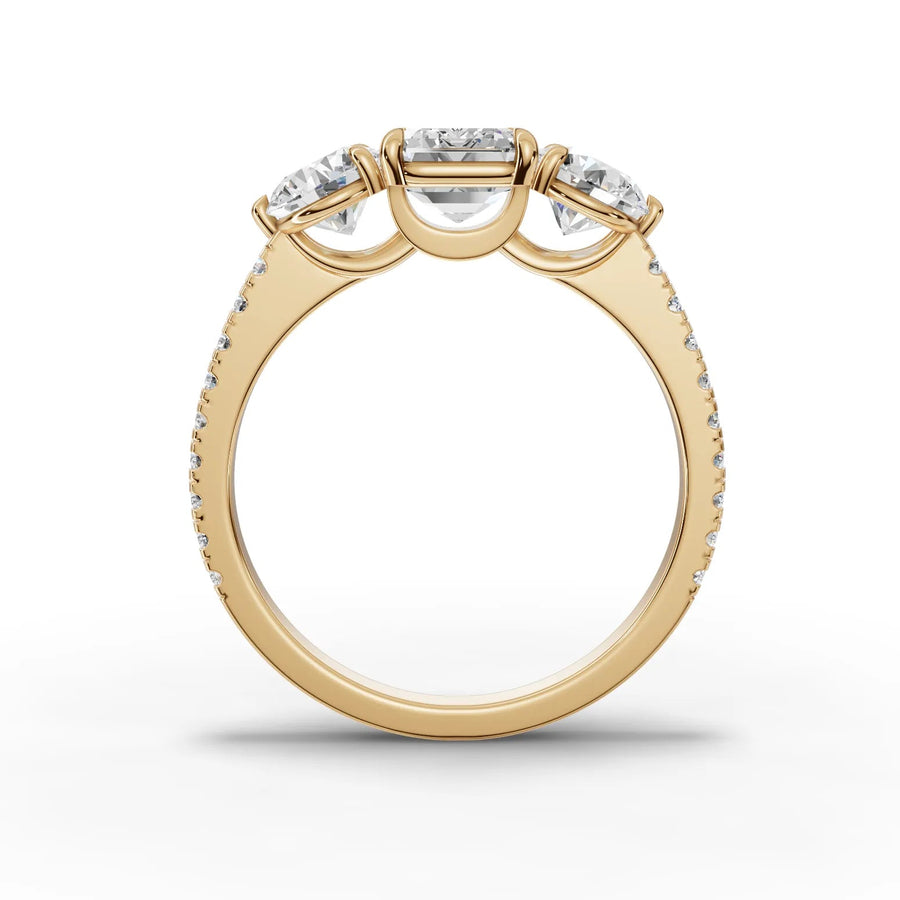 Emerald trinity diamond ring yellow gold angle