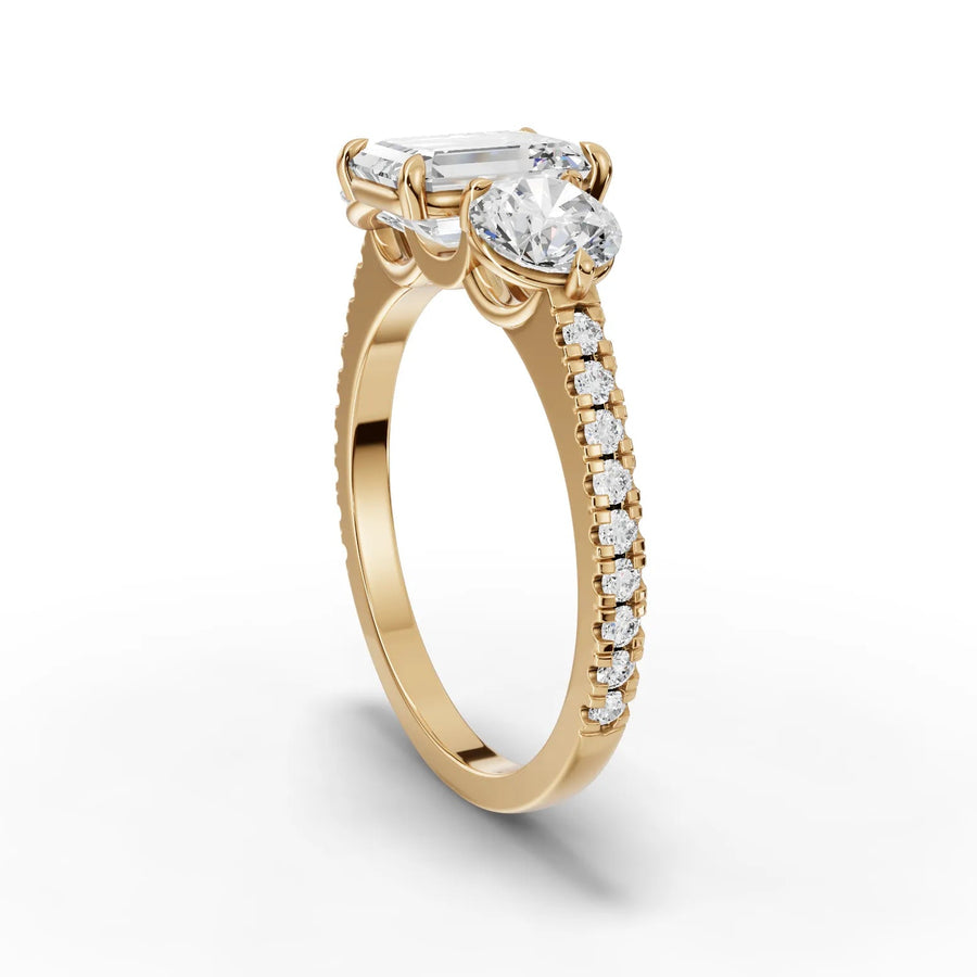 Emerald trinity diamond ring yellow gold angle