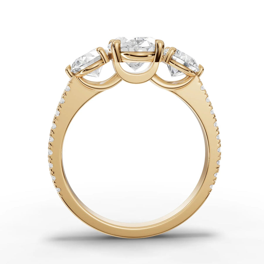 Oval trinity lab-grown ring yellow gold close-up