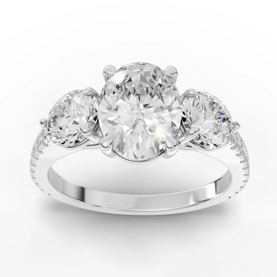 2.72 ct oval three-stone pavé lab diamond ring with 1.50 ct oval center and round side diamonds