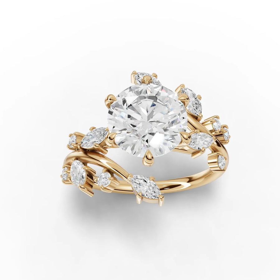 Round diamond ring with marquise accents yellow gold top view