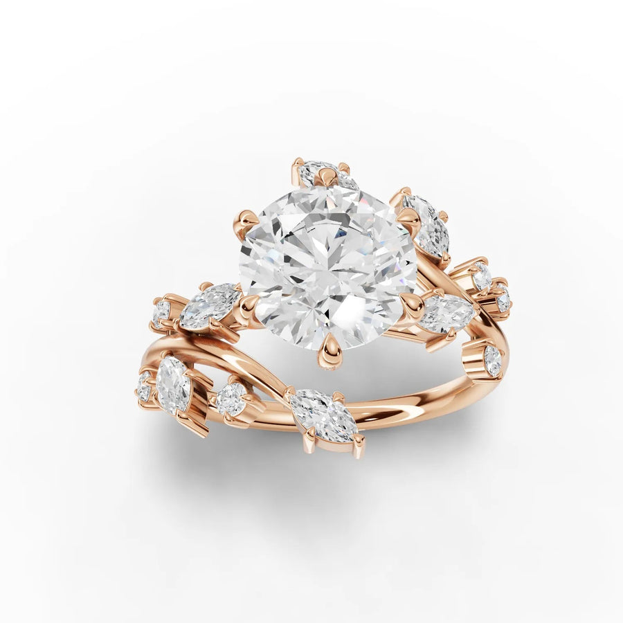 Round diamond ring with marquise accents rose gold top view