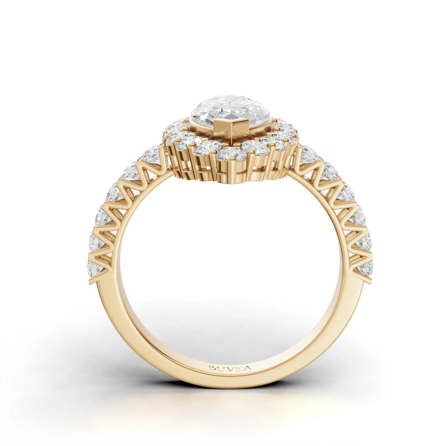Pavé band marquise ring yellow gold close-up