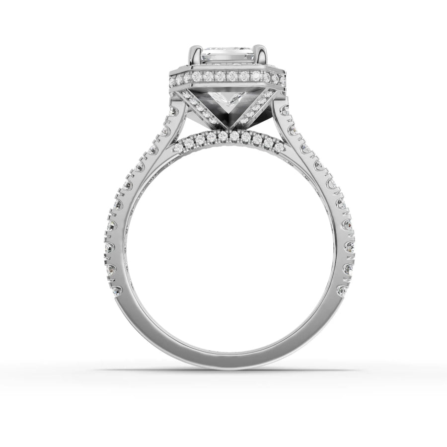 Emerald center halo ring white gold close-up
