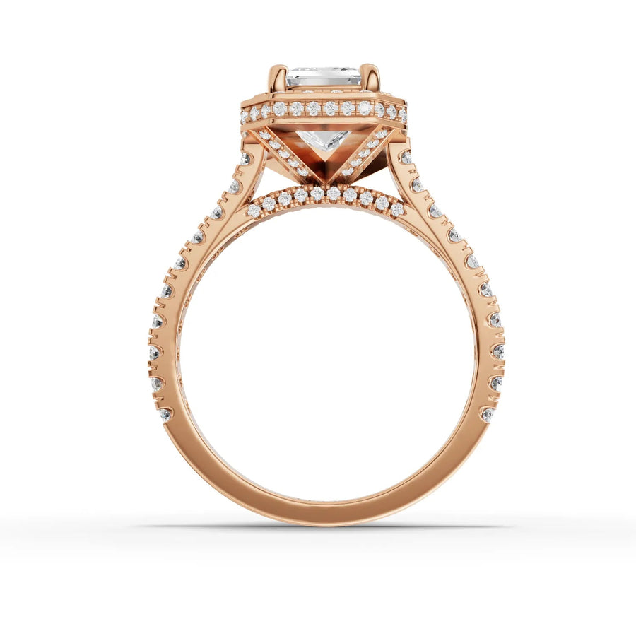 Emerald center halo ring rose gold close-up