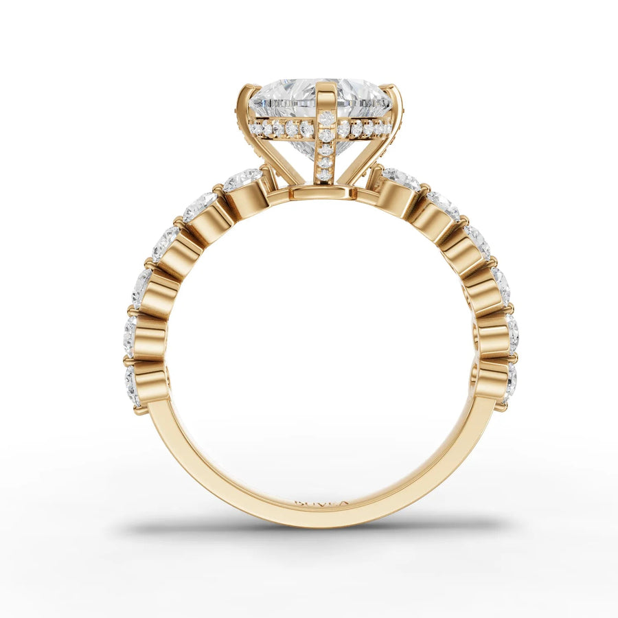 Heart center accented ring yellow gold close-up view