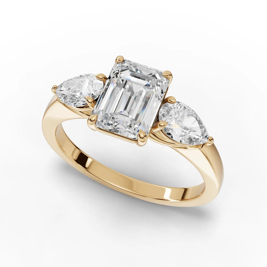 Emerald trinity diamond ring yellow gold angle