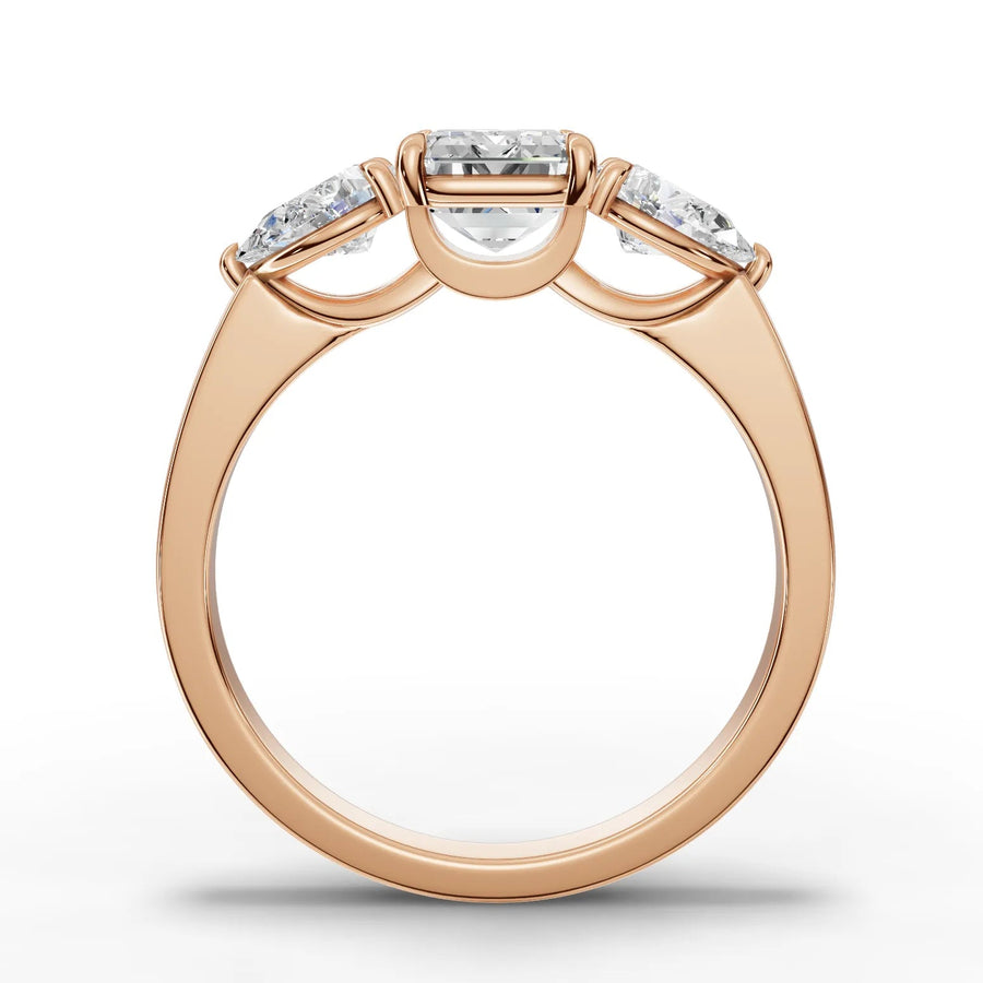 Emerald trinity lab-grown ring rose gold close-up