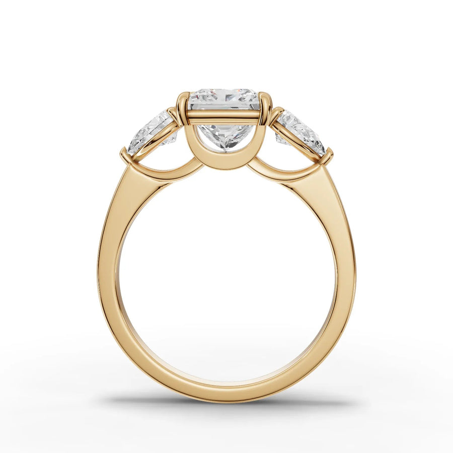 Princess trinity lab-grown ring yellow gold close-up