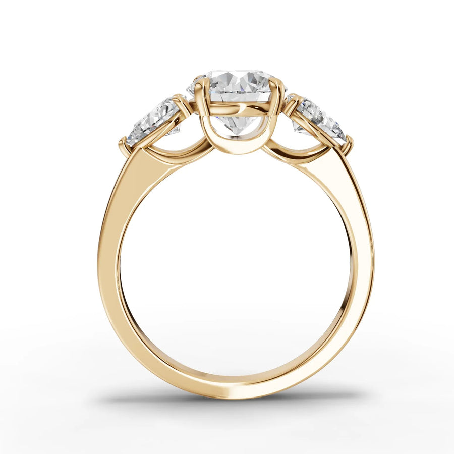 Round trinity lab-grown ring yellow gold close-up