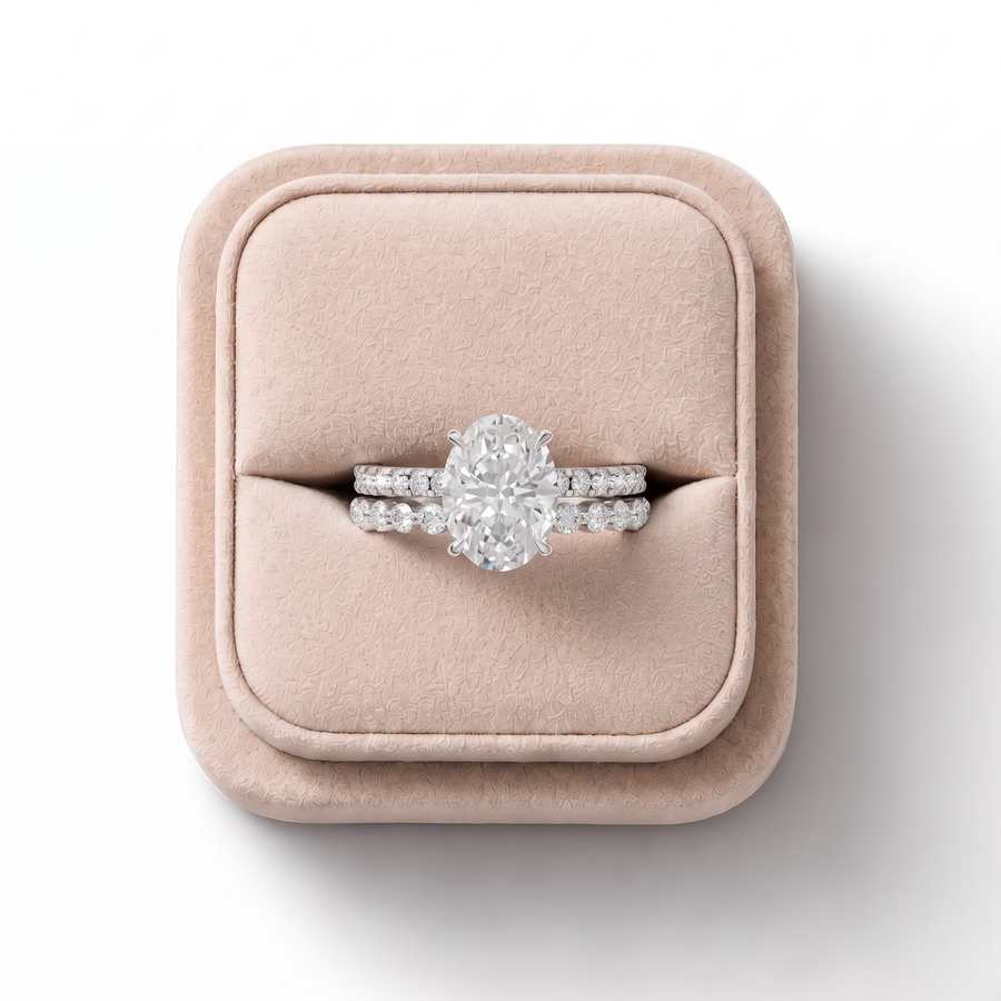 3.88 CT Oval Solitaire with Matching Pavé Lab Grown Diamond Band Set, on a white background