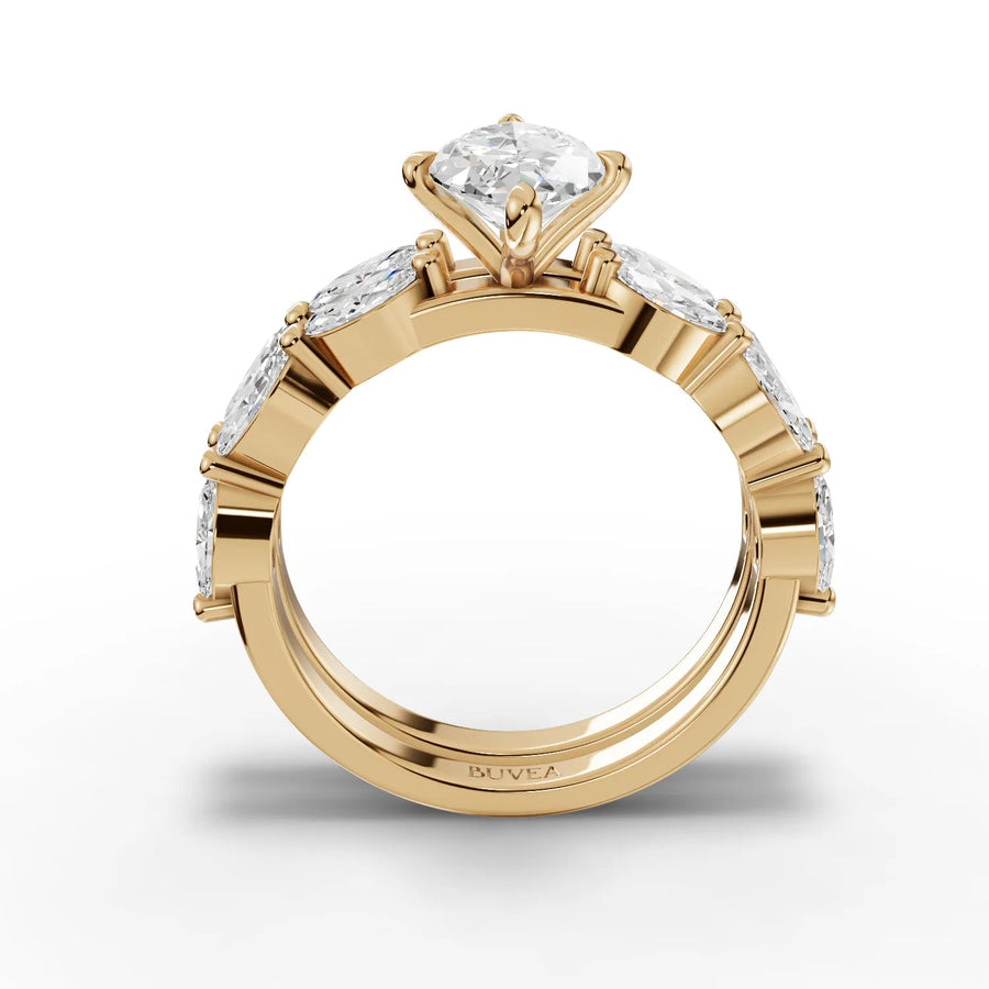 Lab grown diamond ring featuring a 1.5 CT marquise center stone with a gold double-band and accent diamonds.