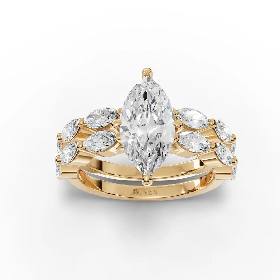 2.84 Ct marquise solitaire ring with gold double band and round accent diamonds, featuring a prong-set center for secure elegance.