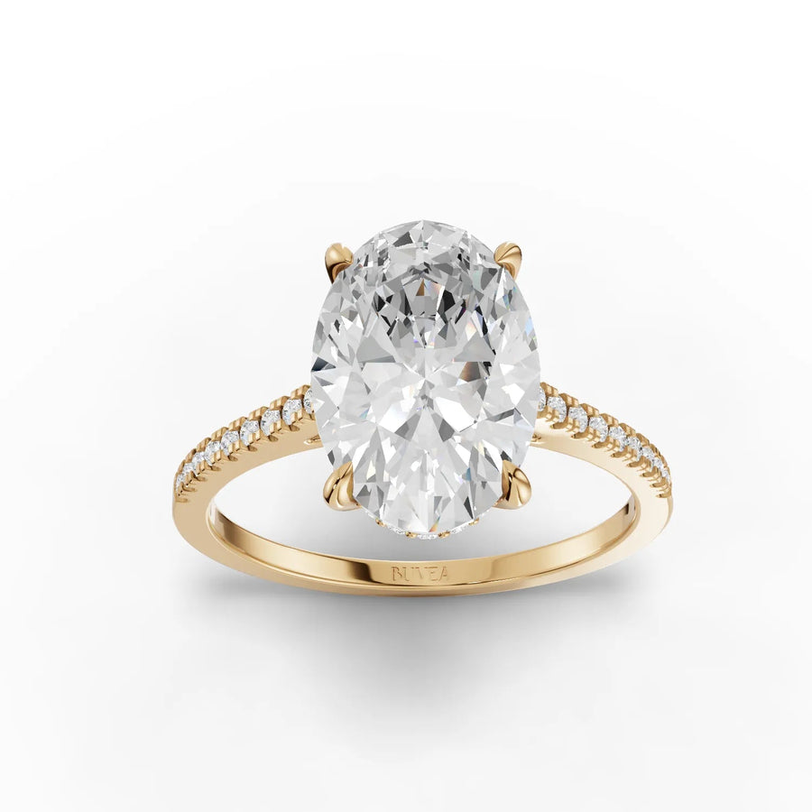 Oval cut lab-grown diamond ring yellow gold top view