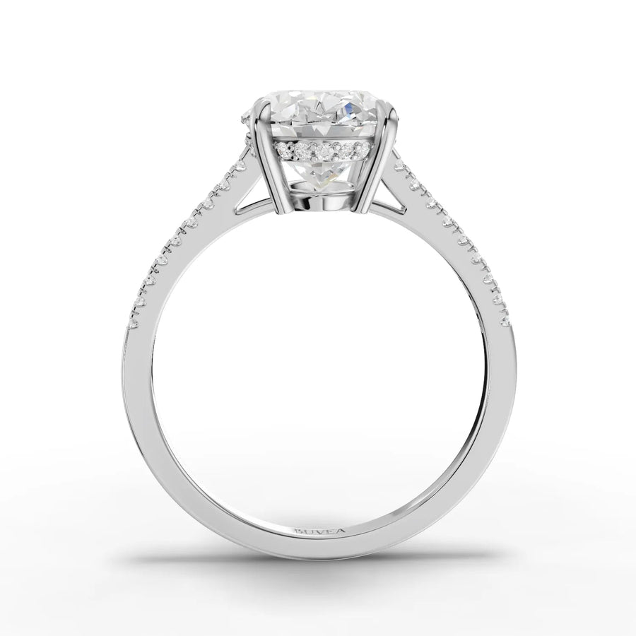 Oval center pavé band ring white gold close-up