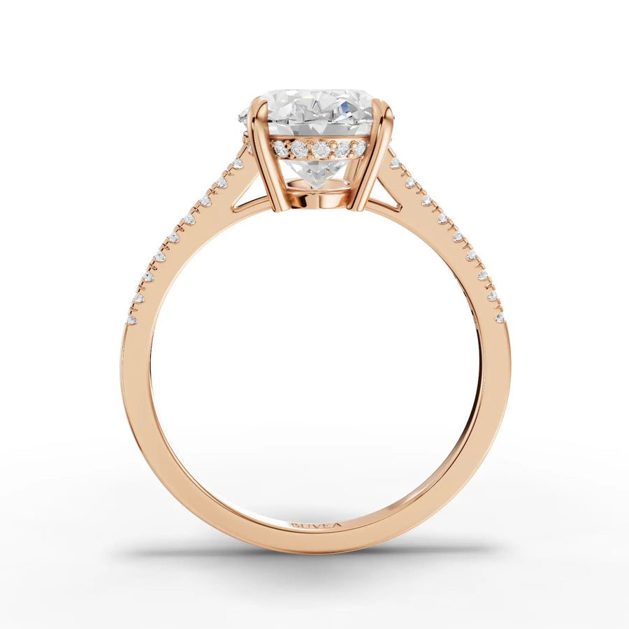 Oval center pavé band ring rose gold close-up