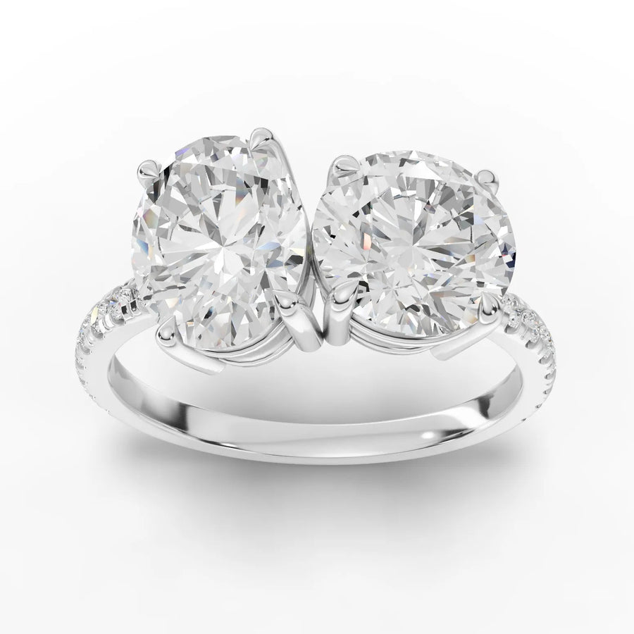 3.16 Ct Toi et Moi lab diamond ring with round and oval center stones and pavé diamond band