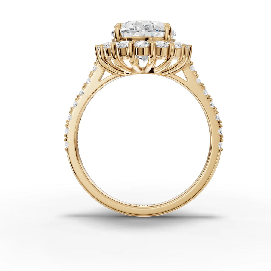 Oval halo ring yellow gold close-up