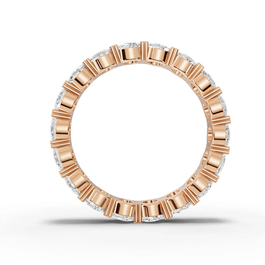 Oval cut lab-grown eternity band rose gold close-up