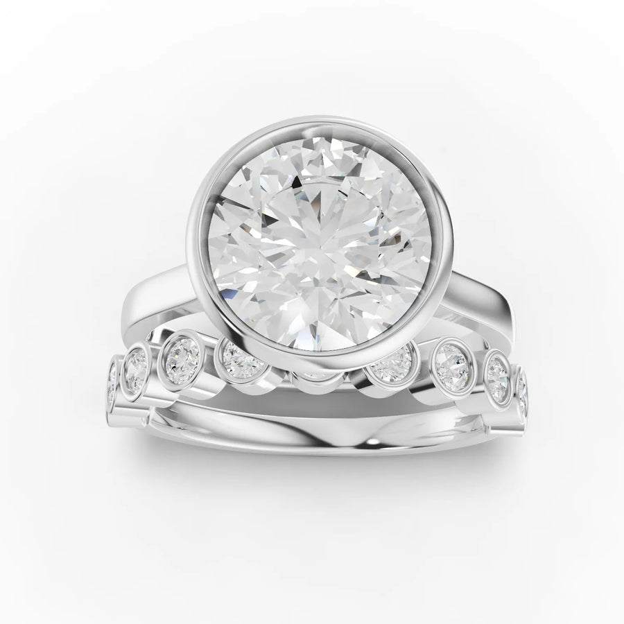 3.38 CT round lab grown diamond bridal set with 3.00 CT center diamond, 11 accent stones, and 18K gold flush-fit bands