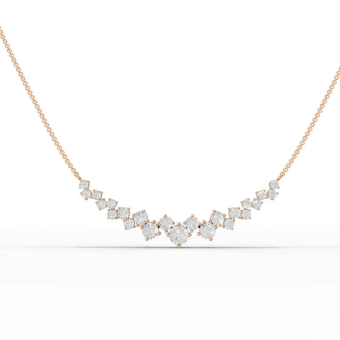 Graduated lab diamond necklace features round diamonds in a V-shape, set in polished 18k gold for a refined look.