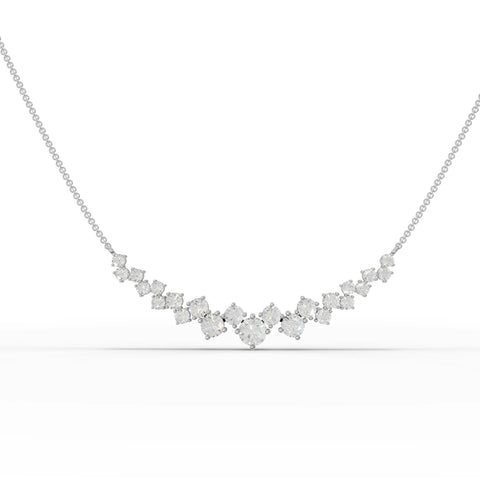 Graduated round lab diamonds create a V-shape in this 18k gold necklace, enhancing the neckline with elegance and sparkle.