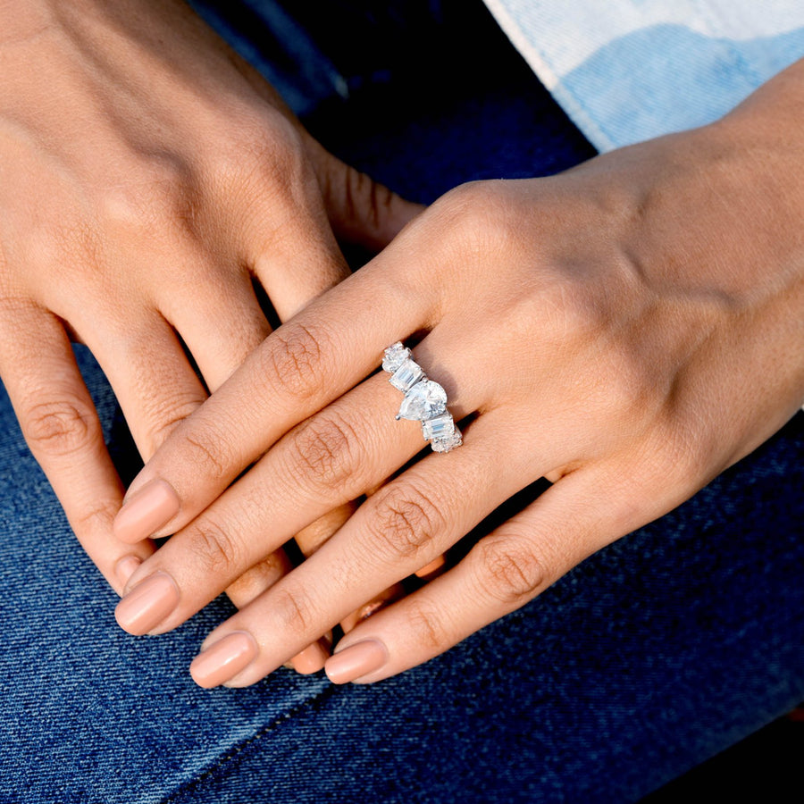 4.50 CT pear center lab-grown diamond ring worn on hand