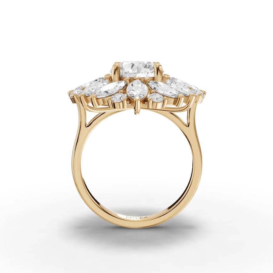 Round center marquise cluster ring yellow gold close-up view