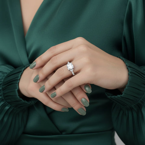 3.30 CT lab-grown diamond cushion three-stone ring worn on hand