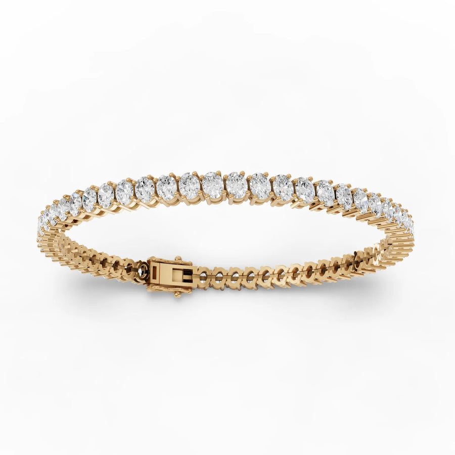 Lab-grown oval tennis bracelet yellow gold close-up