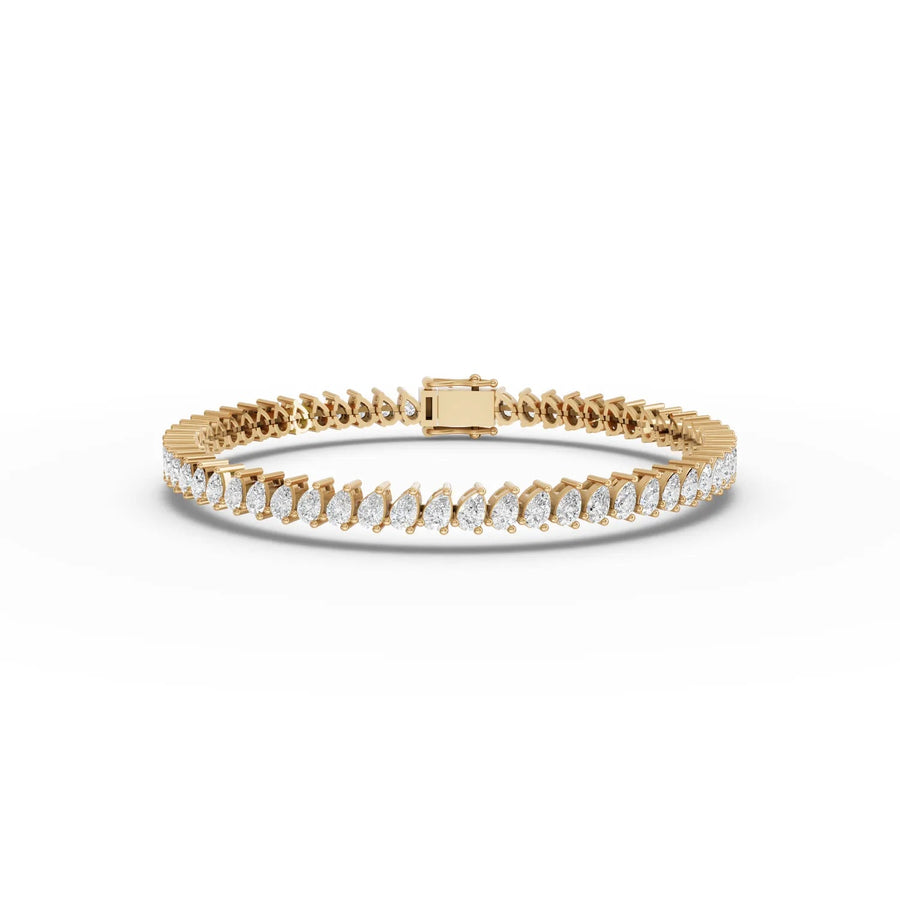 5.46 CT pear lab-grown diamond tennis bracelet yellow gold top